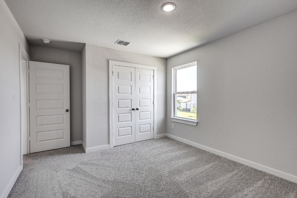 A room with white doors.