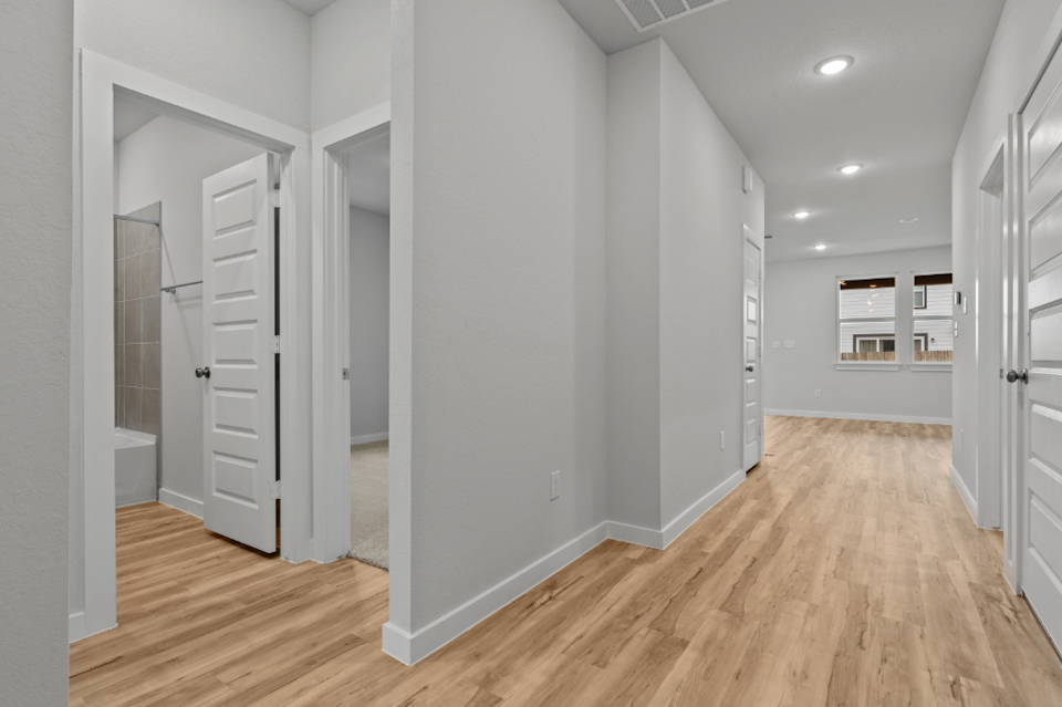 A room with white cabinets.