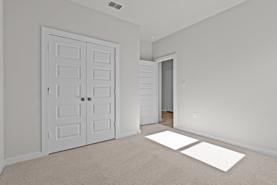 A room with white doors.