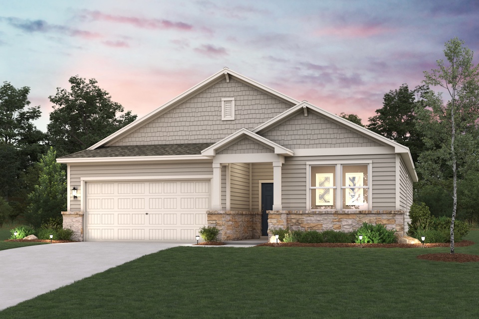 A house with a lawn in front of it.