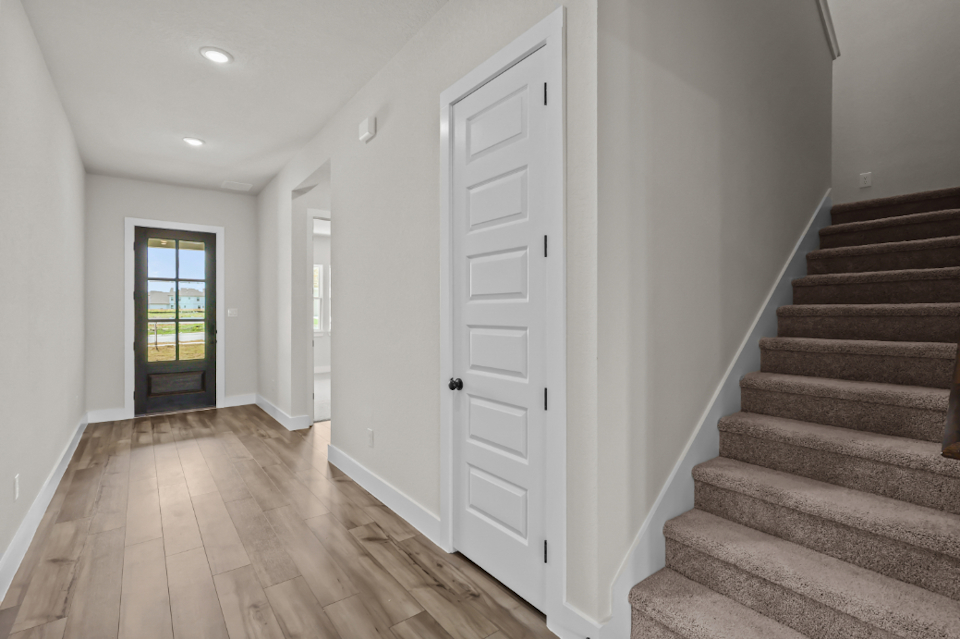 A staircase leading to a door.