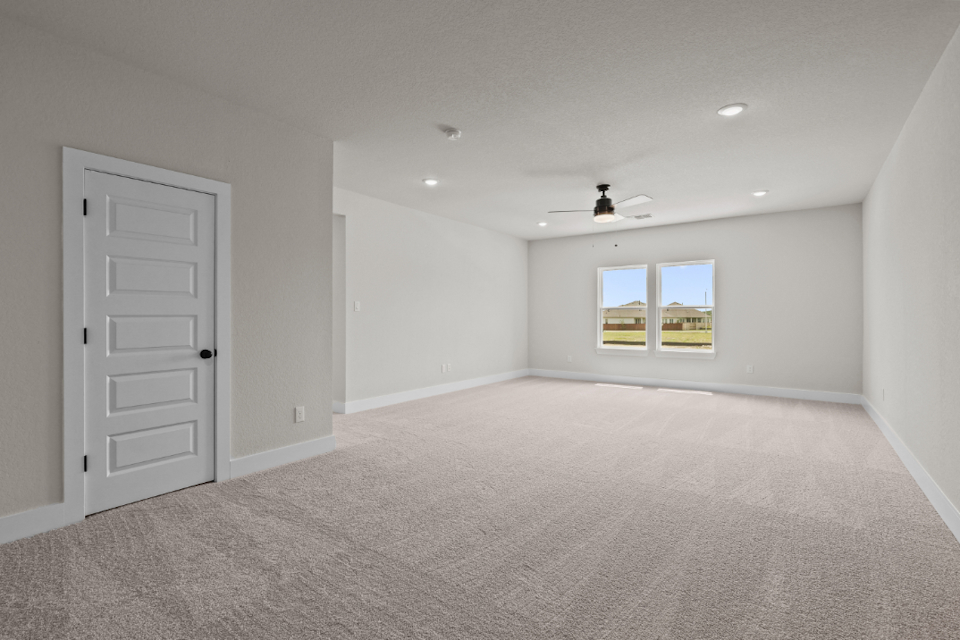 A room with a door and a window.