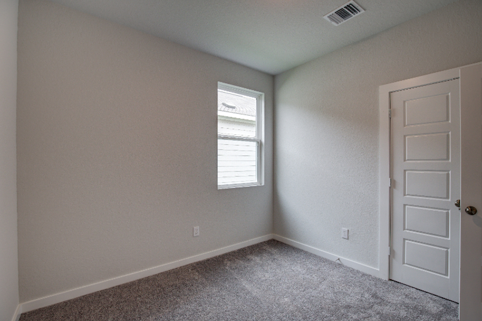 A room with white doors.
