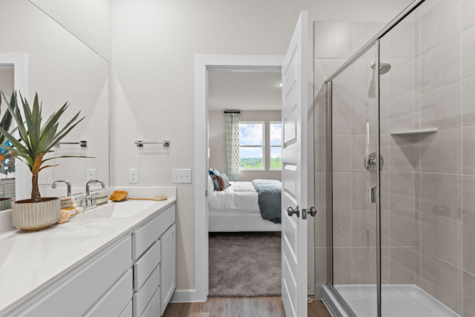 A bathroom with a glass shower.
