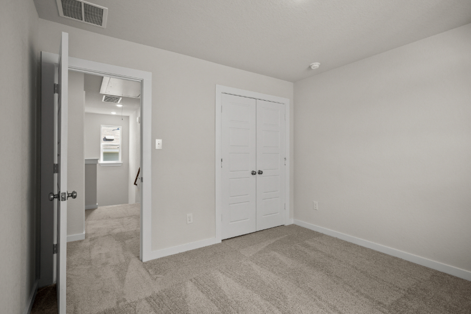 A room with white doors.