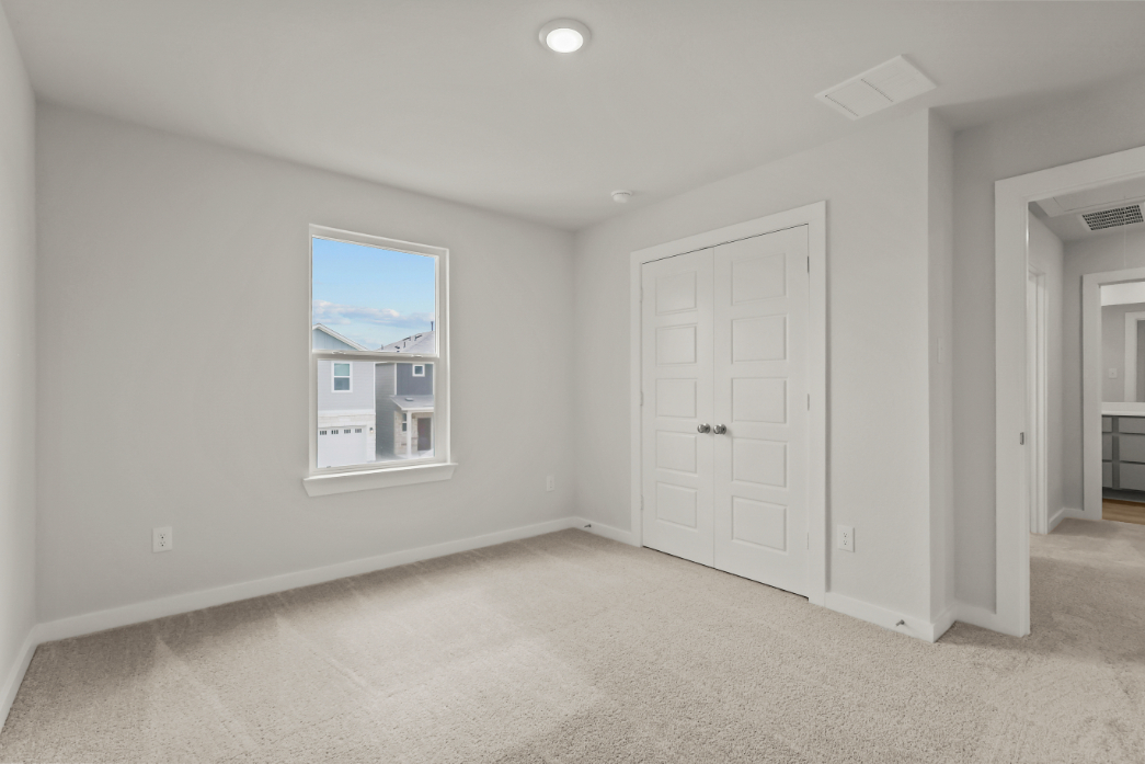 A room with white doors.