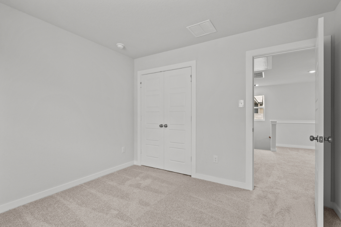 A room with white doors.