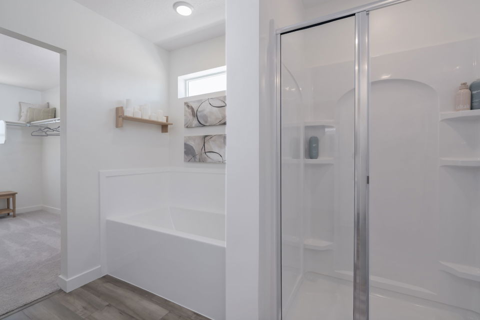 A bathroom with a glass shower.