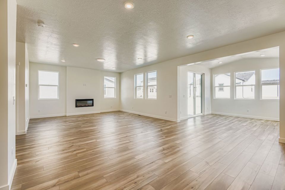 A large empty room with white walls.