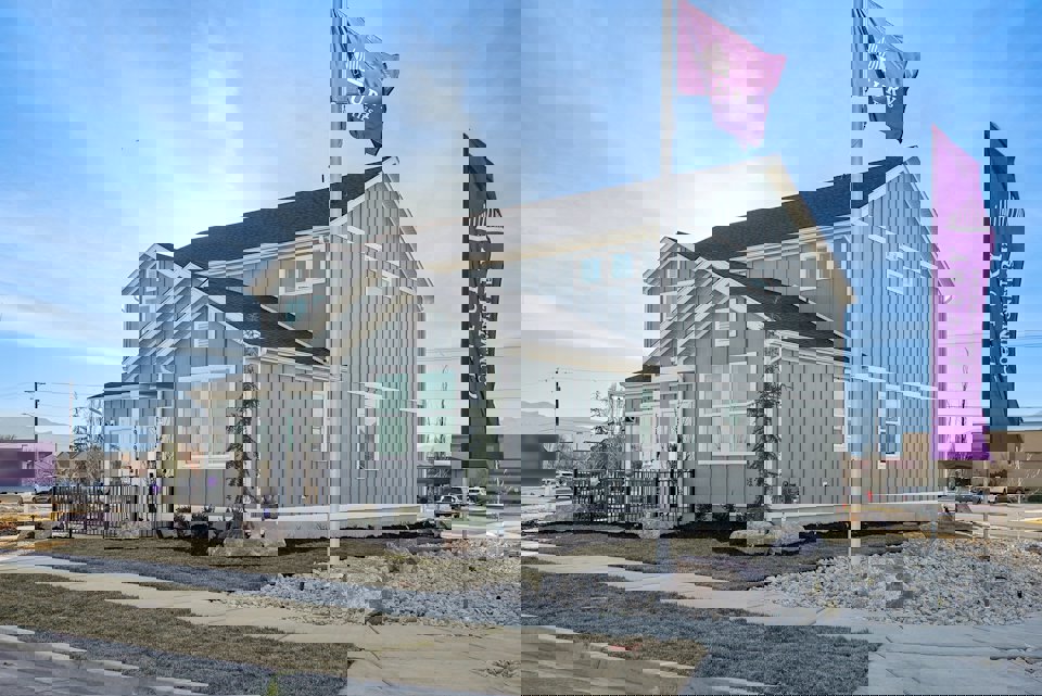 A building with flags in front of it.