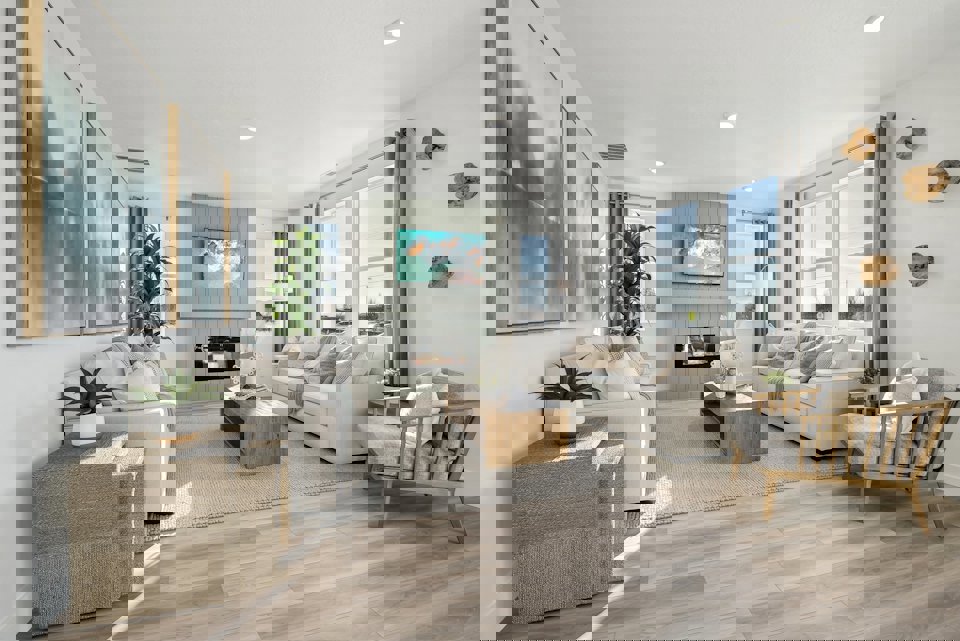 A living room with a large tv.