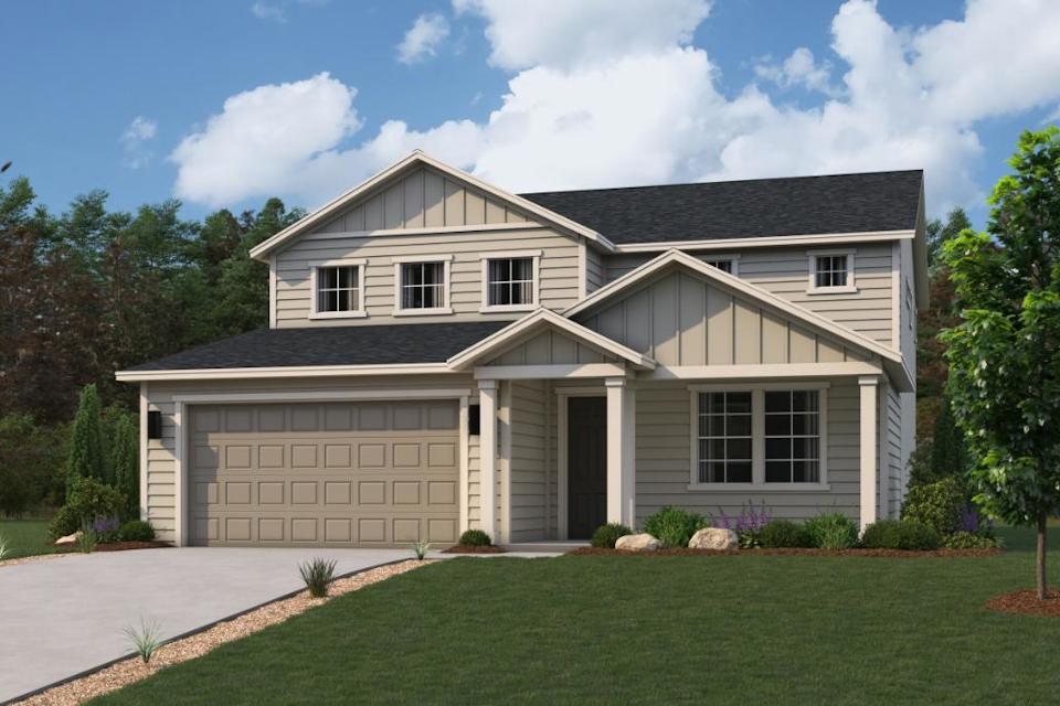 A house with a large front yard.