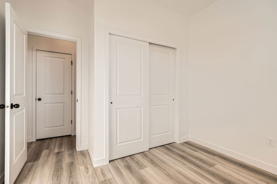 A room with white doors.