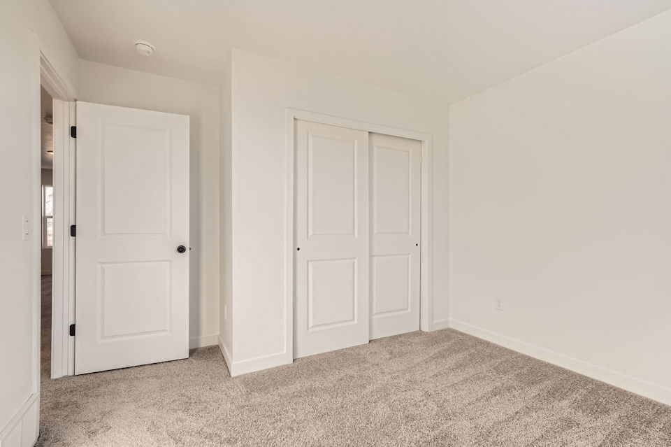 A room with white doors.