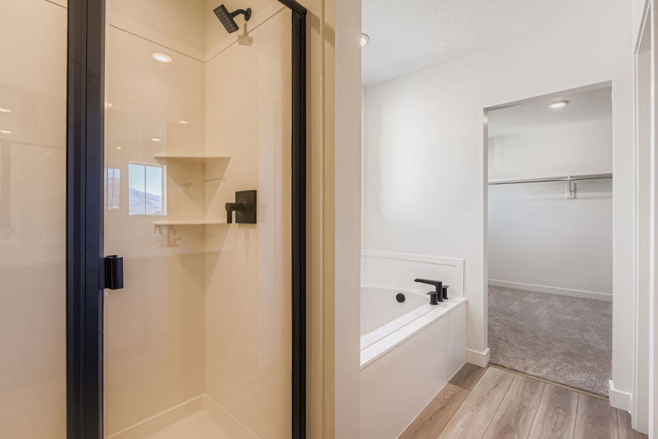 A bathroom with a glass shower.