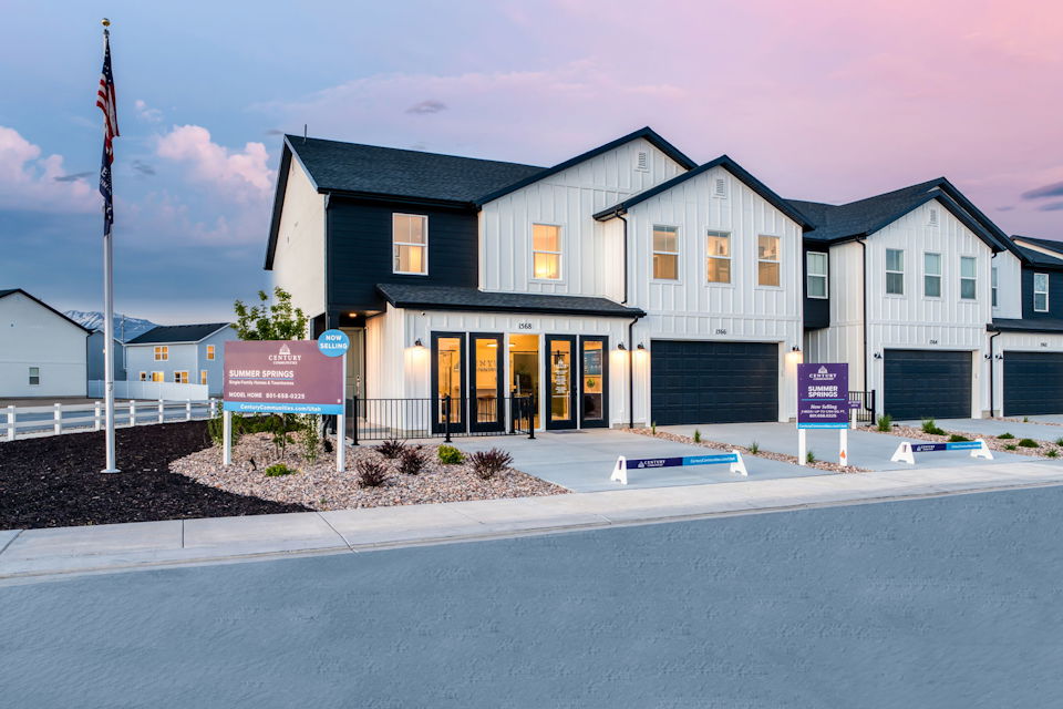 A building with a sign in front.