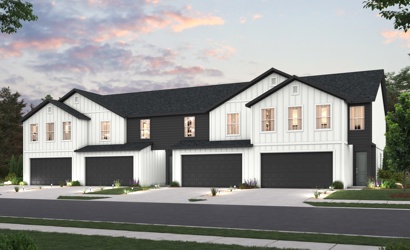 A large house with garages.