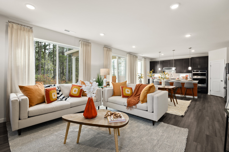 A living room with a large window.