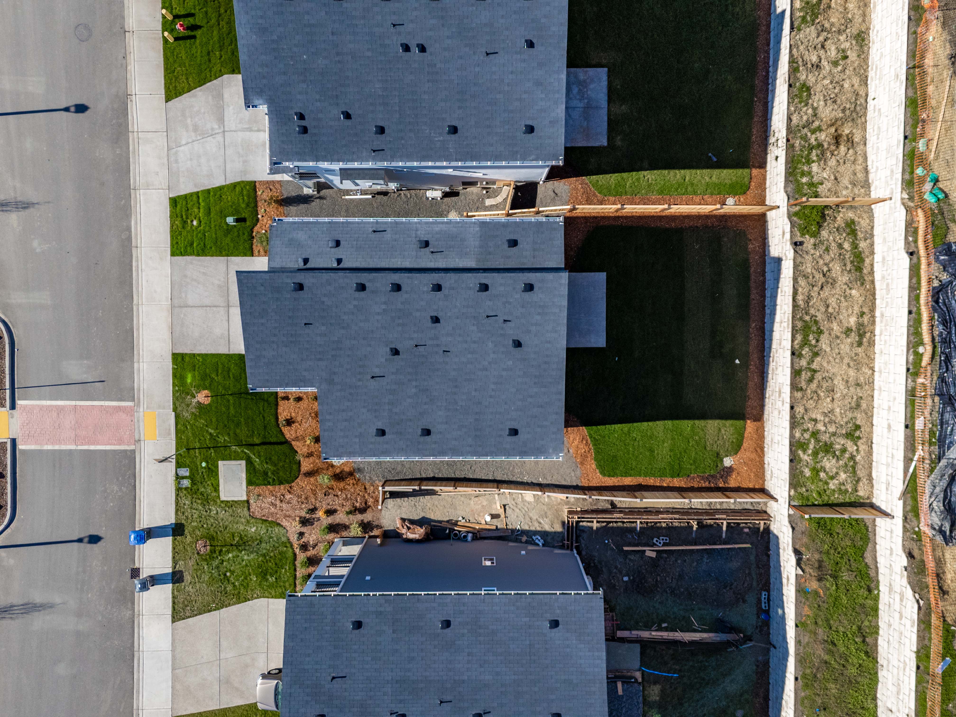 A building with a grass field.
