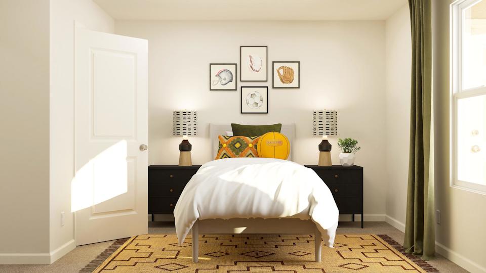 A bedroom with a bed and a table.