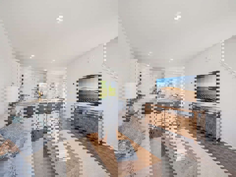 A living room with a tv and couches.