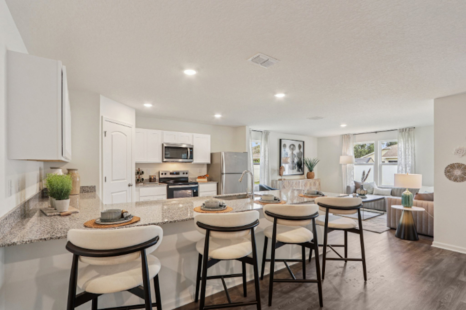 A kitchen with a large island.