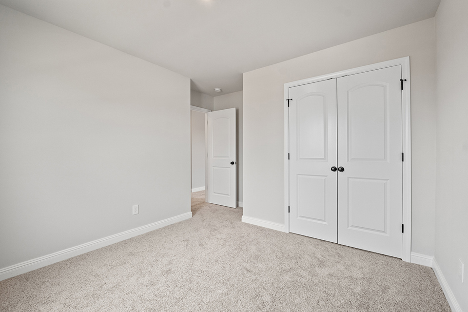 A room with white doors.
