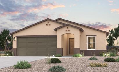 A house with a gravel driveway.