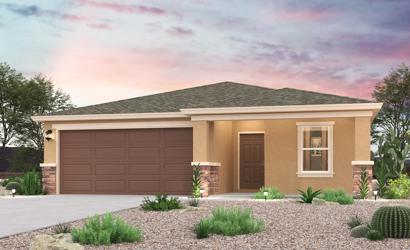 A house with a gravel driveway.