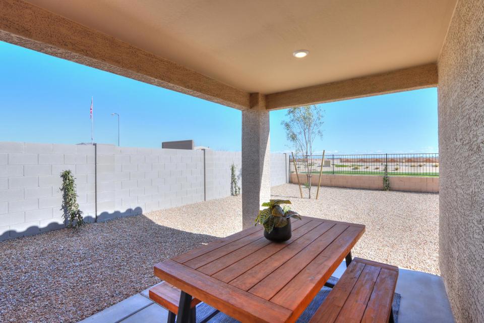 A table and chairs in a room.