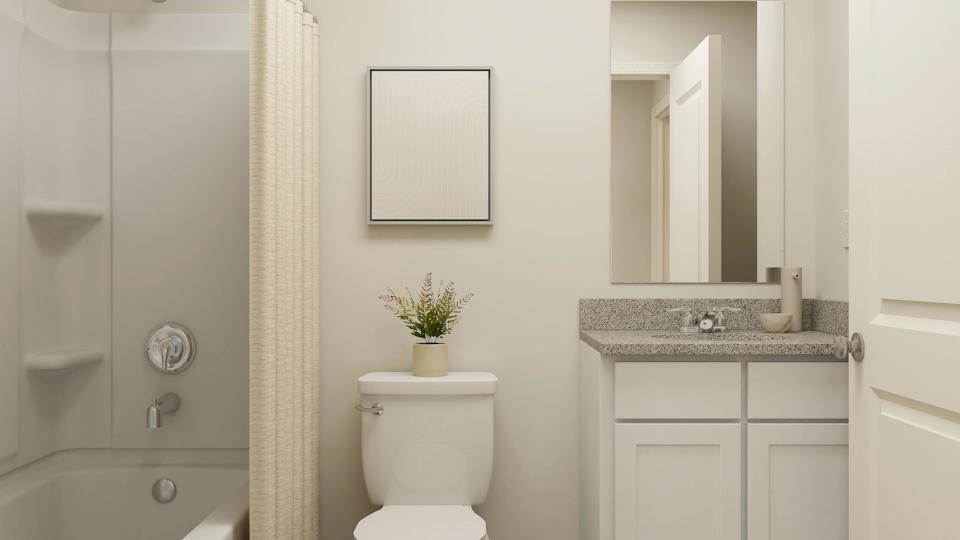 A bathroom with a toilet and sink.