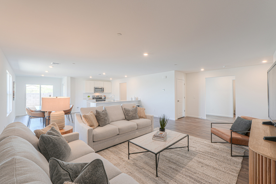 A living room with a couch and a coffee table.