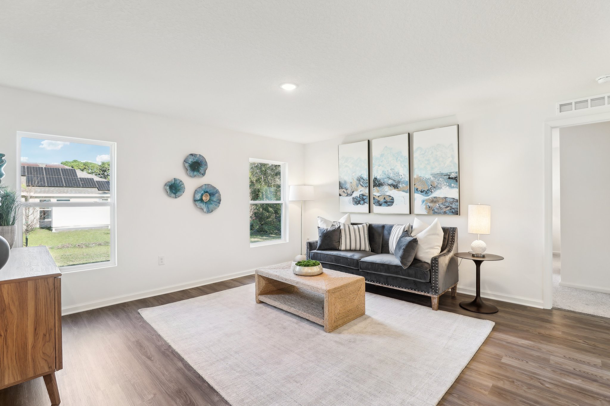 A living room with a couch and a coffee table.