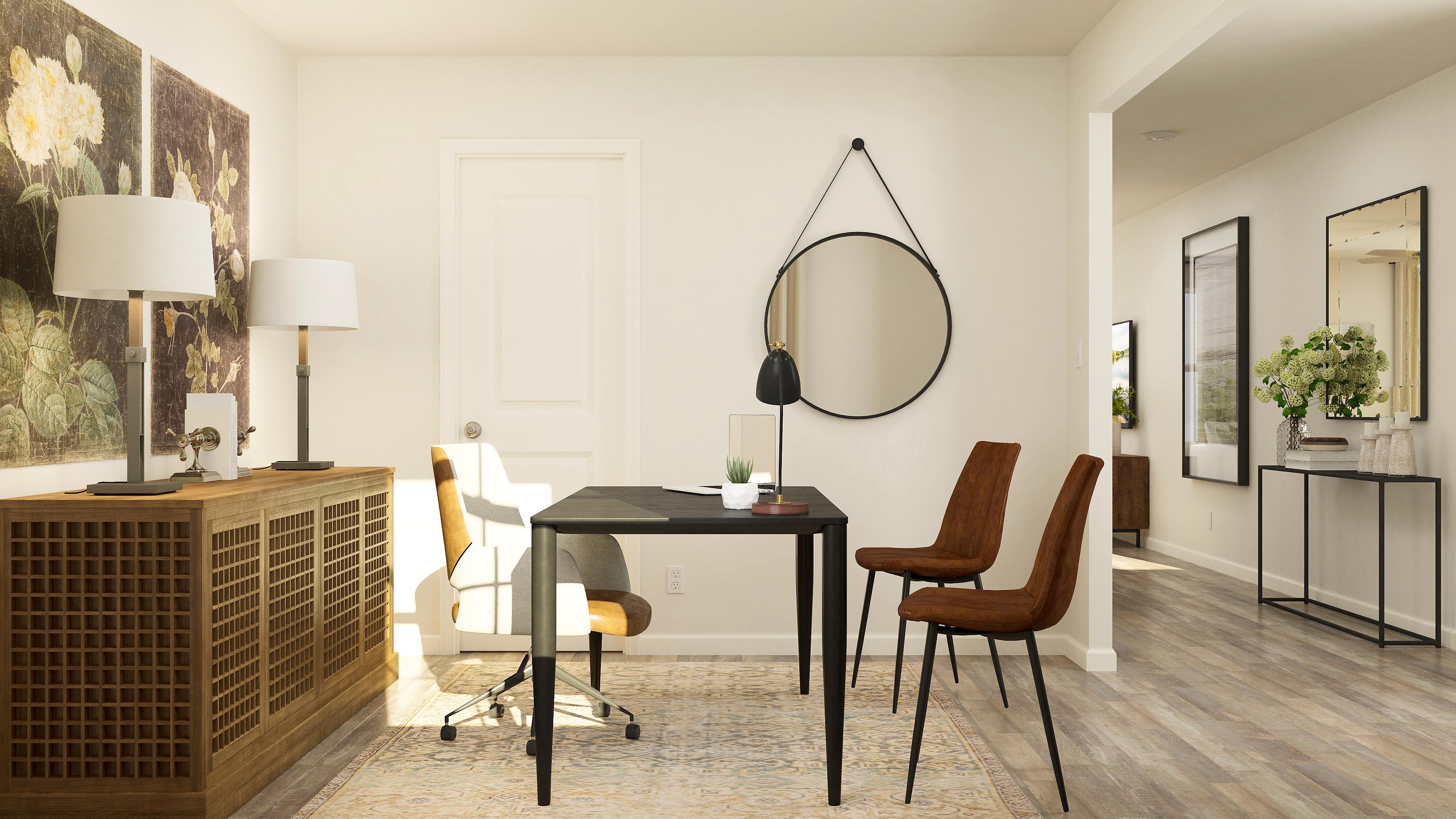 A room with a table and chairs.