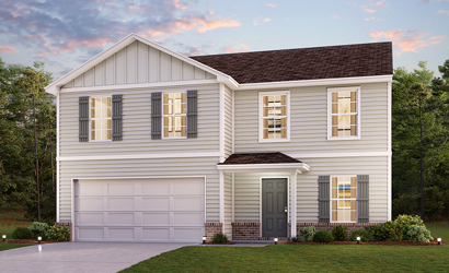 A white house with a garage.