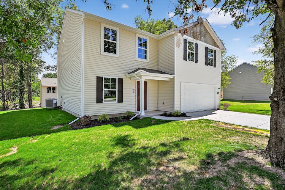 A house with a lawn.