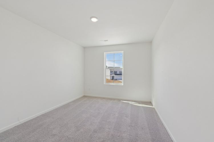 A hallway with a window.