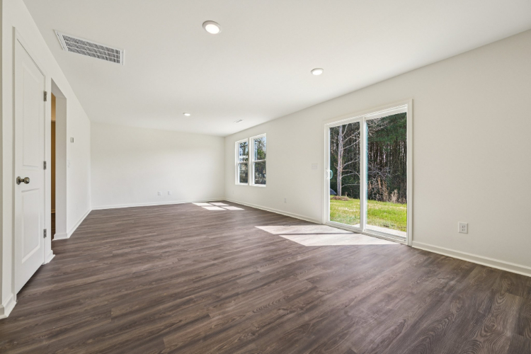A room with a wood floor and a wood floor.