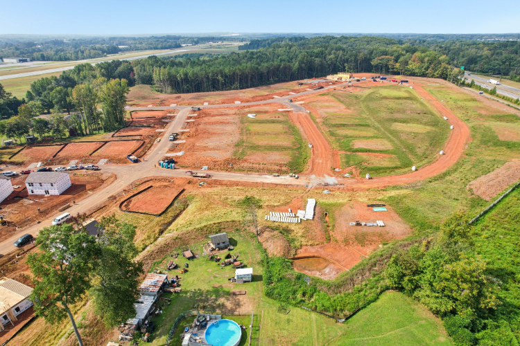A landscape with trees and buildings.