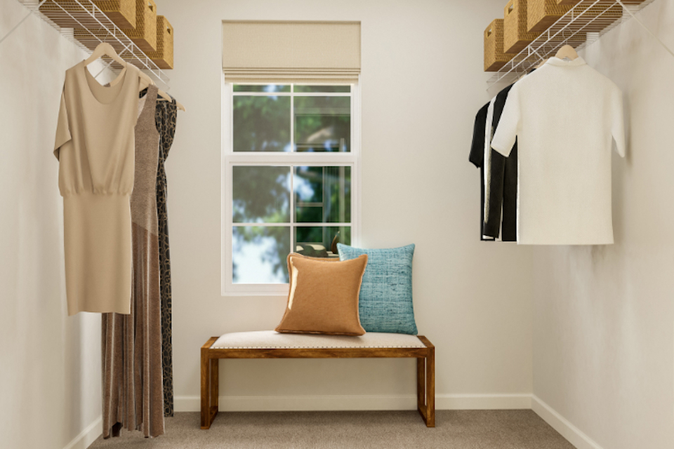 A room with a bed and a window.