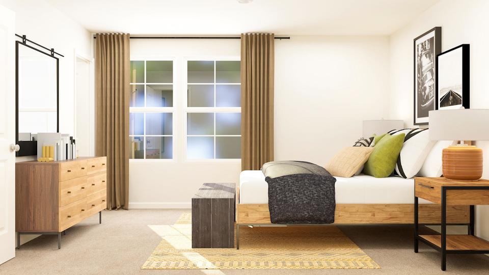 A living room with a couch and a table.