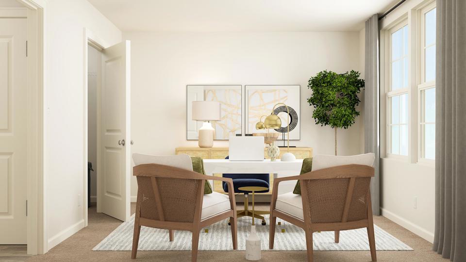 A dining room with a table and chairs.