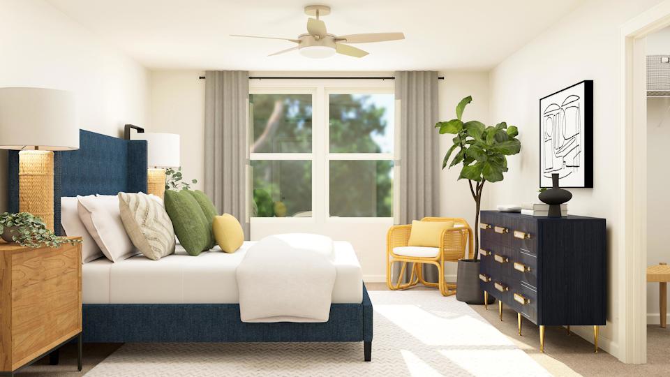 A living room with a couch and a table.