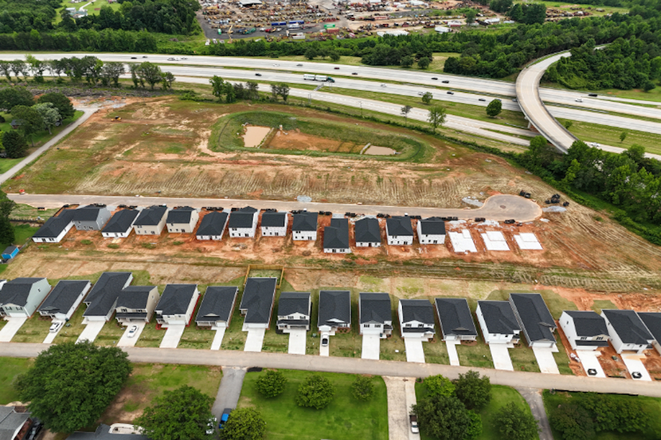 A parking lot with many cars.