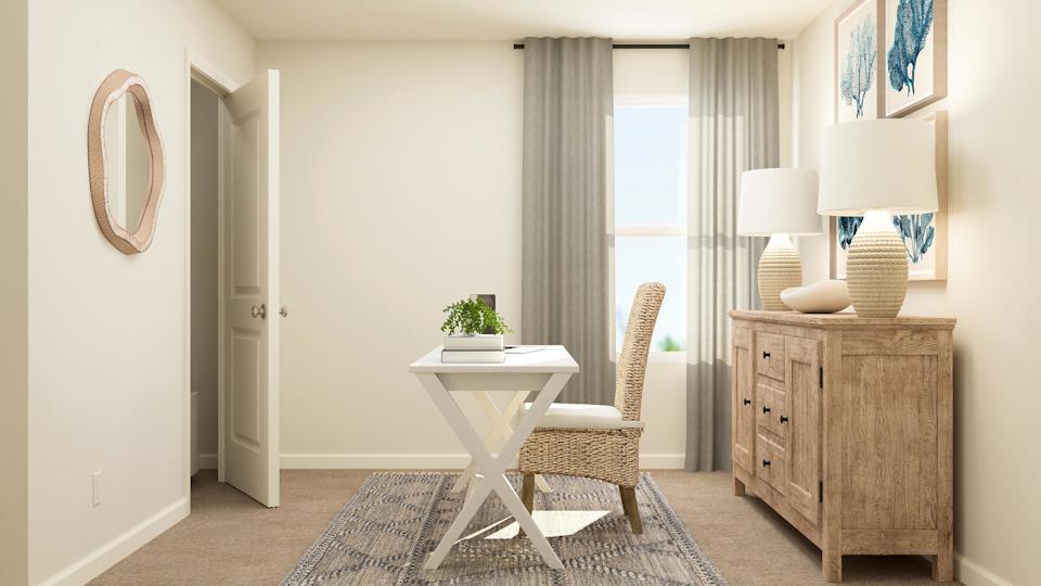 A room with a table and chairs.