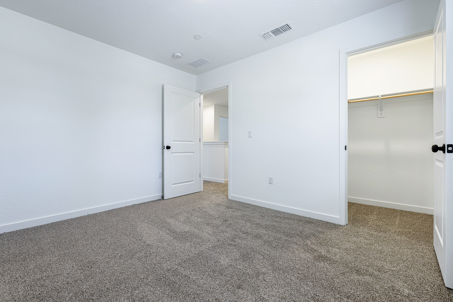 A room with white doors.